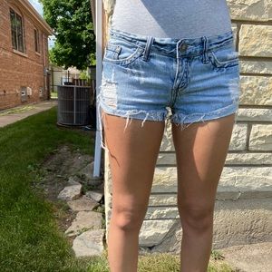 Ripped mini jean shorts